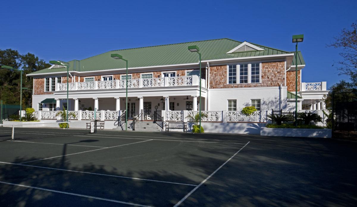 Exterior view of building with tennis courts